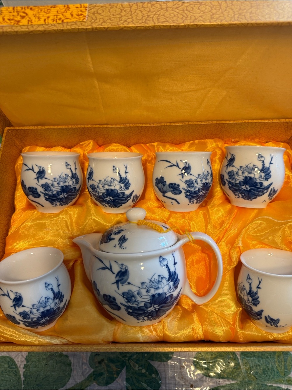 Blue and White Porcelain Tea Set with Decorative Floral Motif